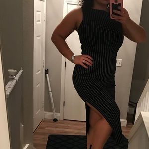 Black ankle-length dress with white pinstripes